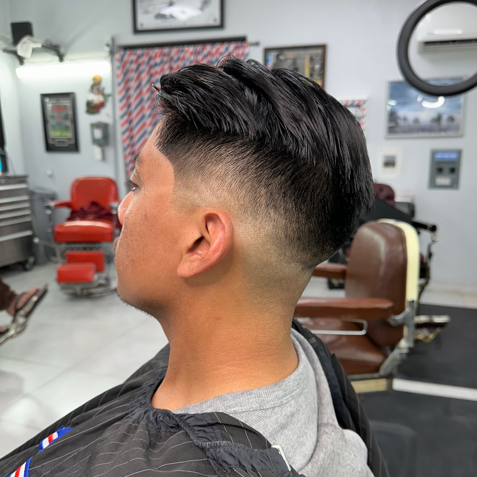 Mid fade with slick longer top